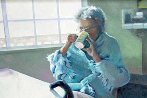 woman sitting at table blanket chairs window counter